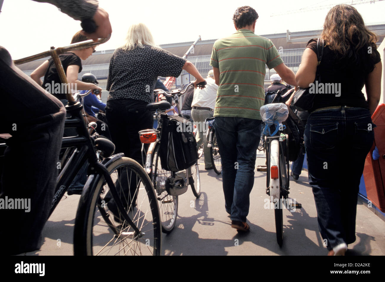 Netherlands. Amsterdam. Near Centraal Station. Cyclists Disembarking From Ferry. Bicycles. Stock Photo