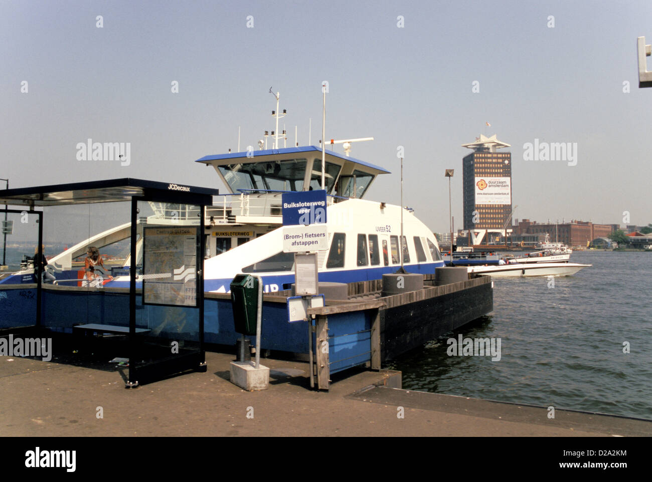 Netherlands. Amsterdam. Near Centraal Station. Ferry At Dock. Boats. Harbor. Het Ij. Stock Photo