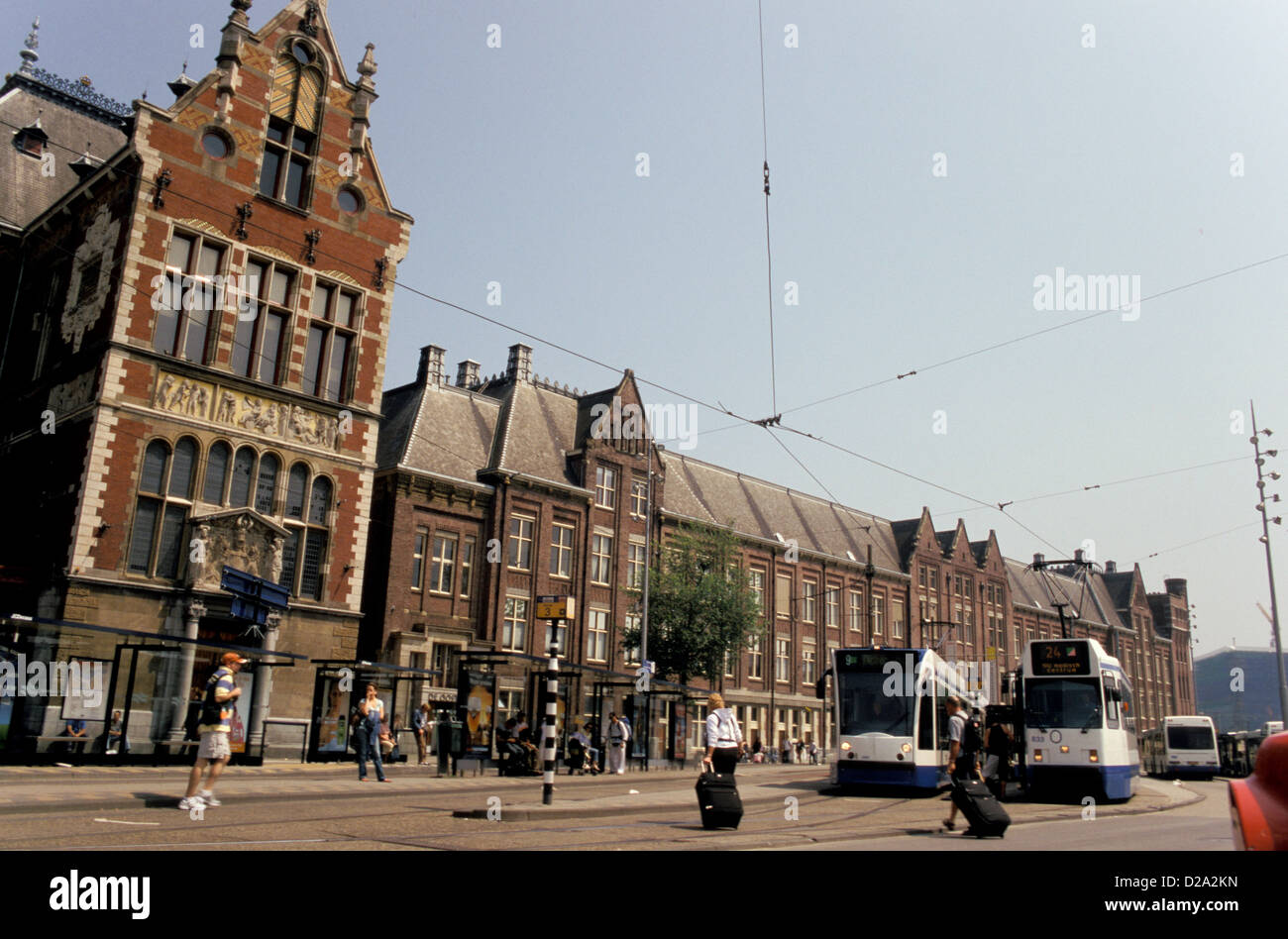 Netherlands. Amsterdam. Centraal Station Detail. Trams. Bus. Stock Photo