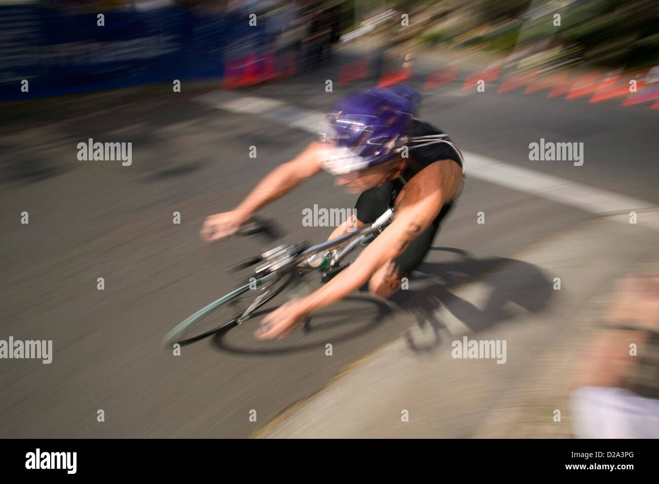 Honolulu, Hawaii Bicyclist Rounds A Corner During The Bike Leg Of The