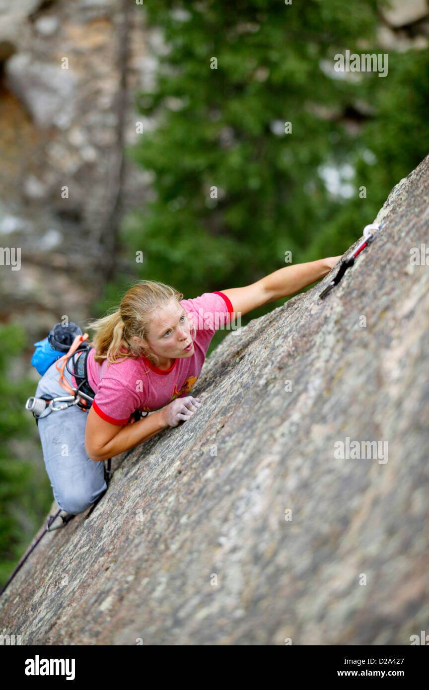 Colorado, Boulder. Female Climbing "The Memory Of Trees" On Watermark