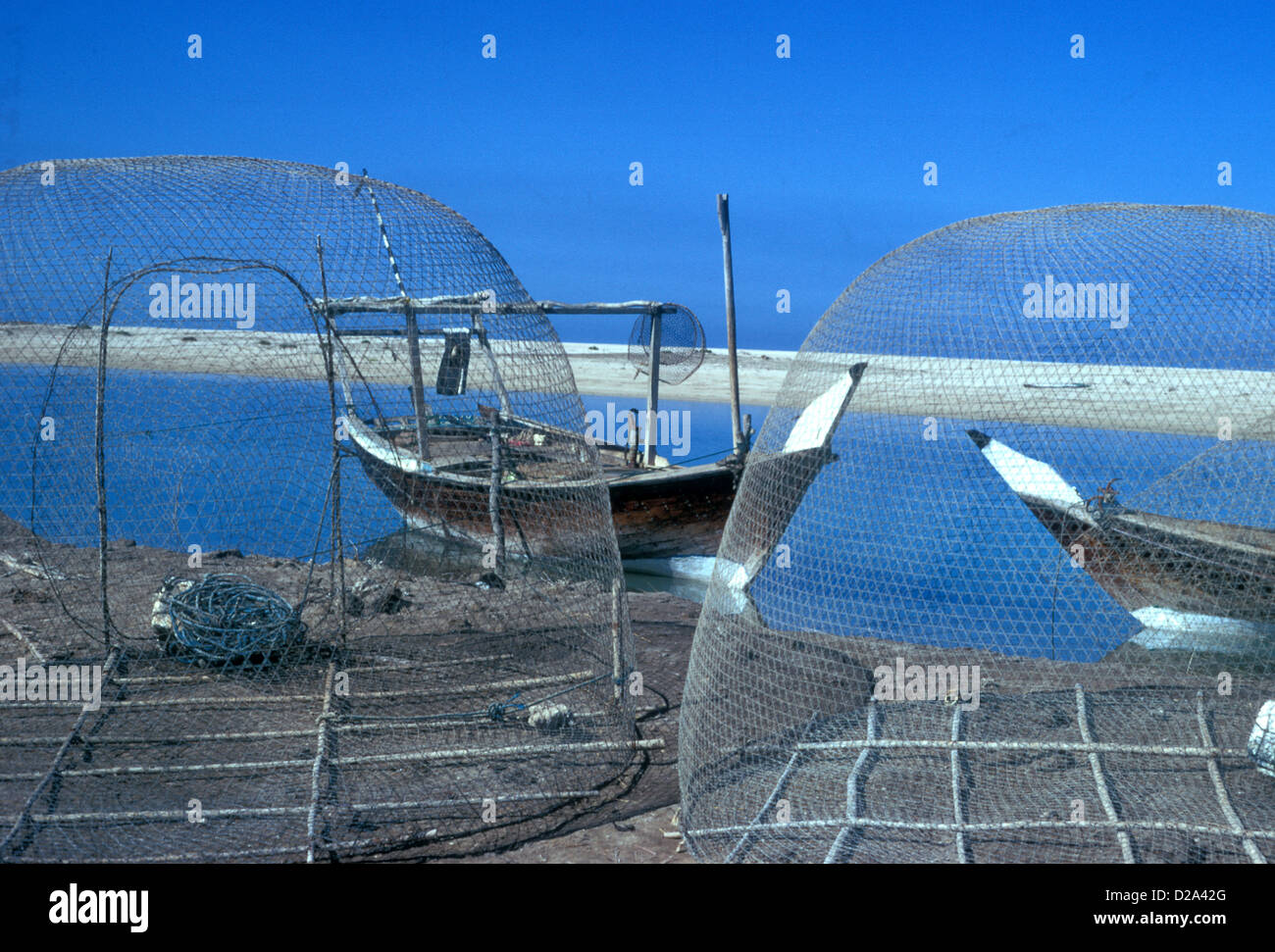 Dhows and fish traps Umm al Quwain 1976 Stock Photo Alamy