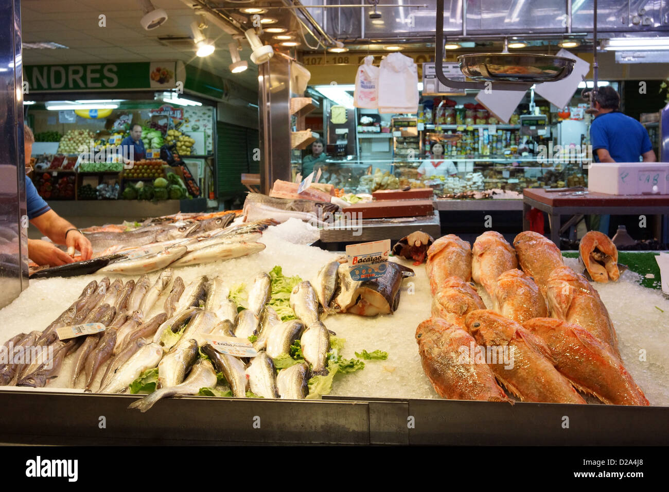 fresh fish market spain food madrid seafood vendor fishmonger Stock