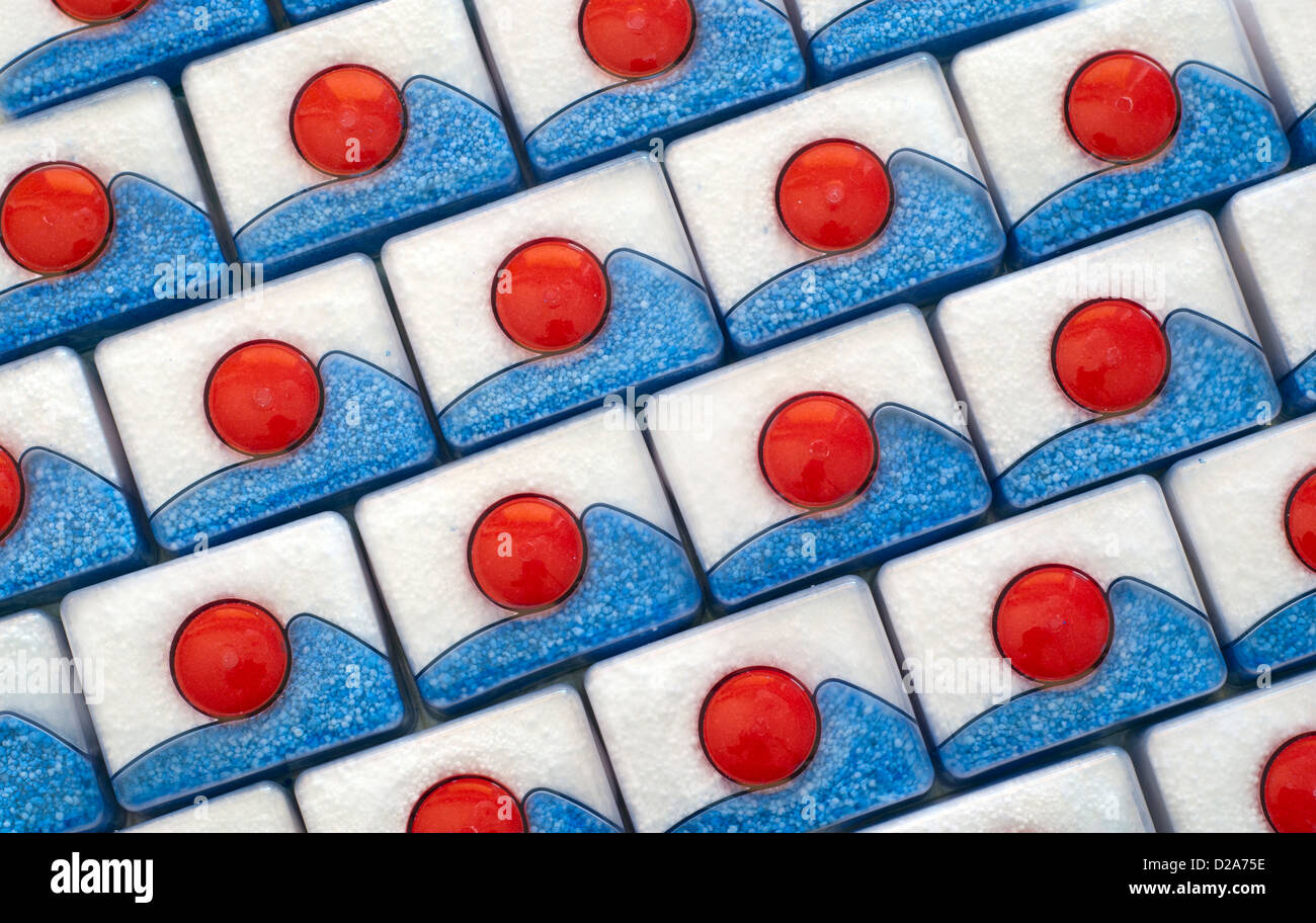 Board with many dishwasher tablets Stock Photo Alamy