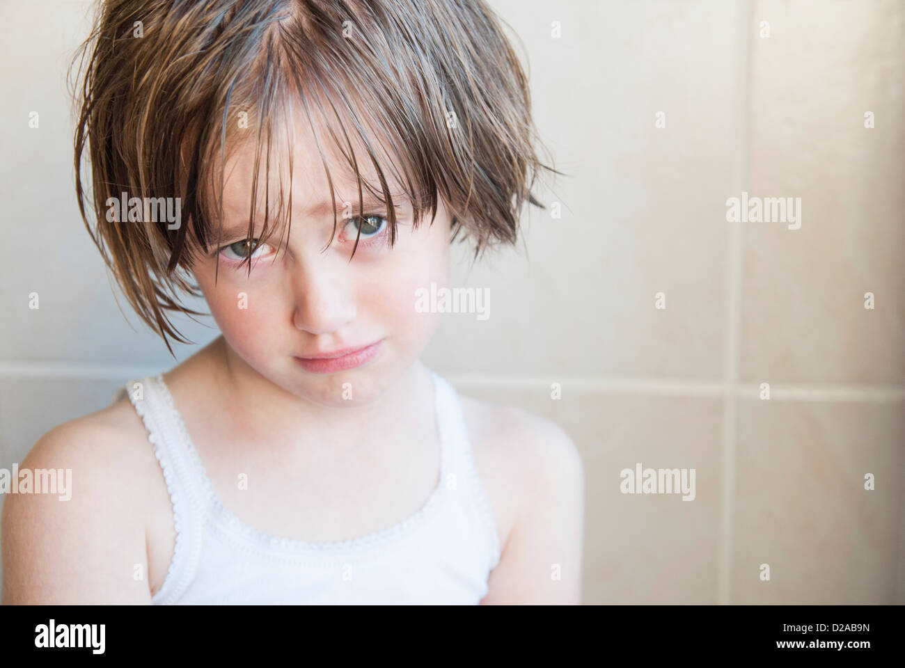 Girl crying in bathroom Stock Photo Alamy