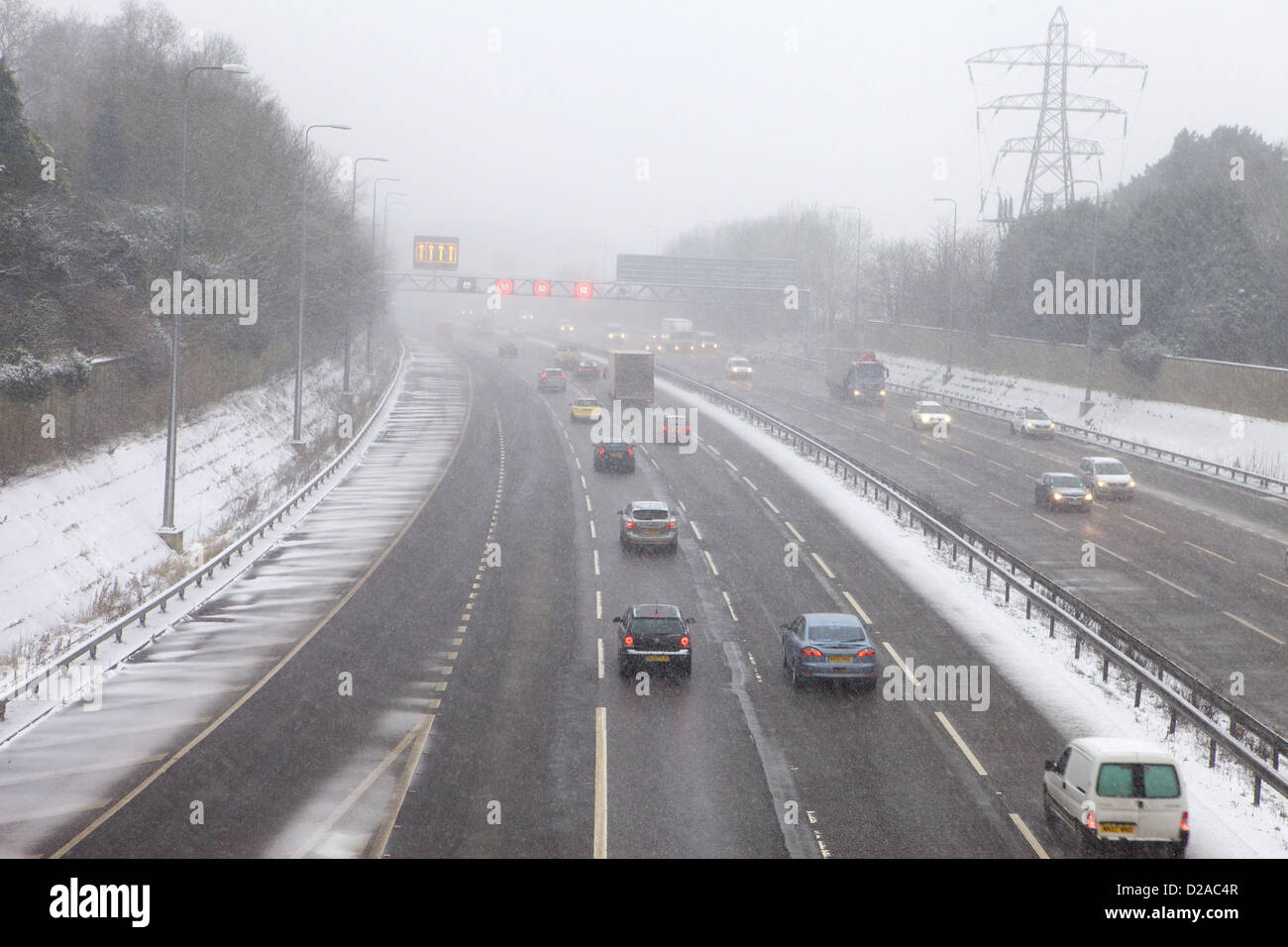 Solihull, UK. 18th January 2013. Snow fall across many parts of England and Wales  causes poor driving conditions, Motorways like the M42 past Solihull. Credit:  TJPhotos / Alamy Live News Stock Photo