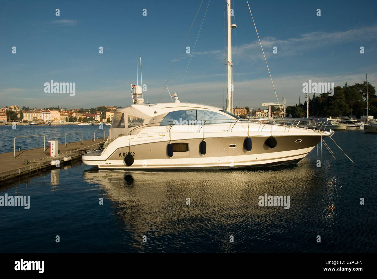 Boat / Yacht in the harbour in the seaside village of Rovinj Croatia. Stock Photo