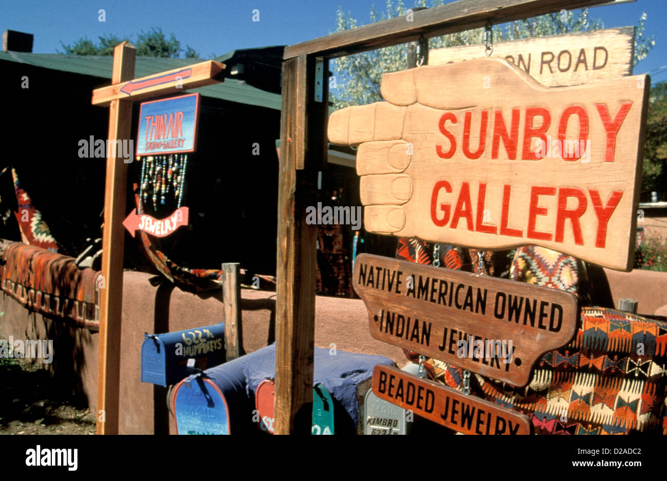 New Mexico, Santa Fe, Canyon Road. Signs For Jewelry Store, Native American Owned. Stock Photo