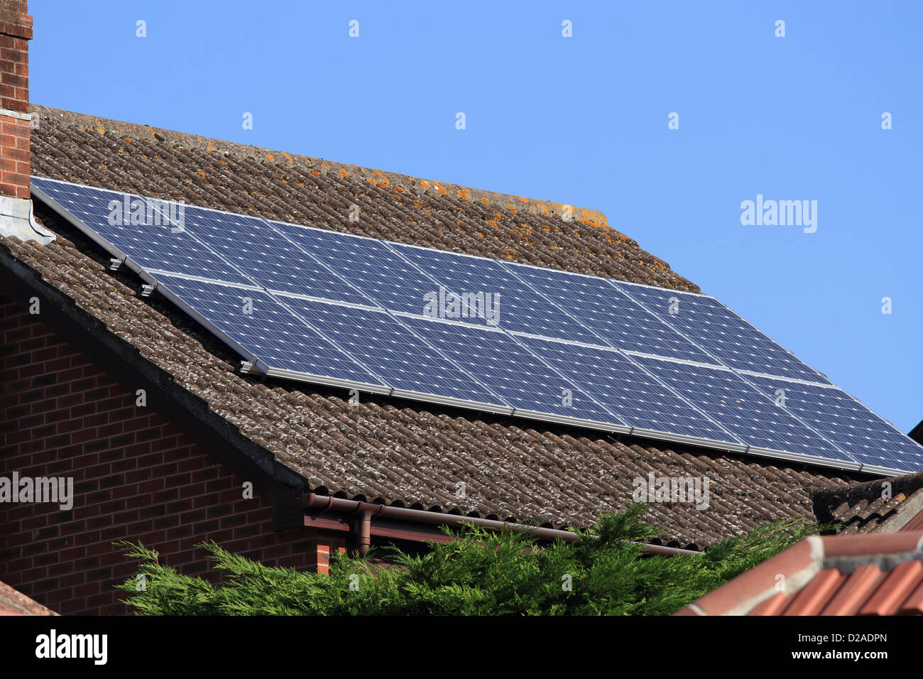 Solar photovoltaic panels on house roof Stock Photo - Alamy