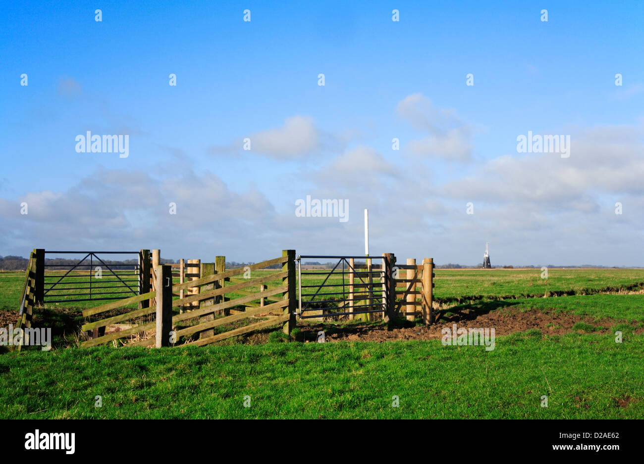 Farm gateways and access gate for the Weavers Way crossing a drainage ditch by Halvergate Marshes, Norfolk, England, UK. Stock Photo