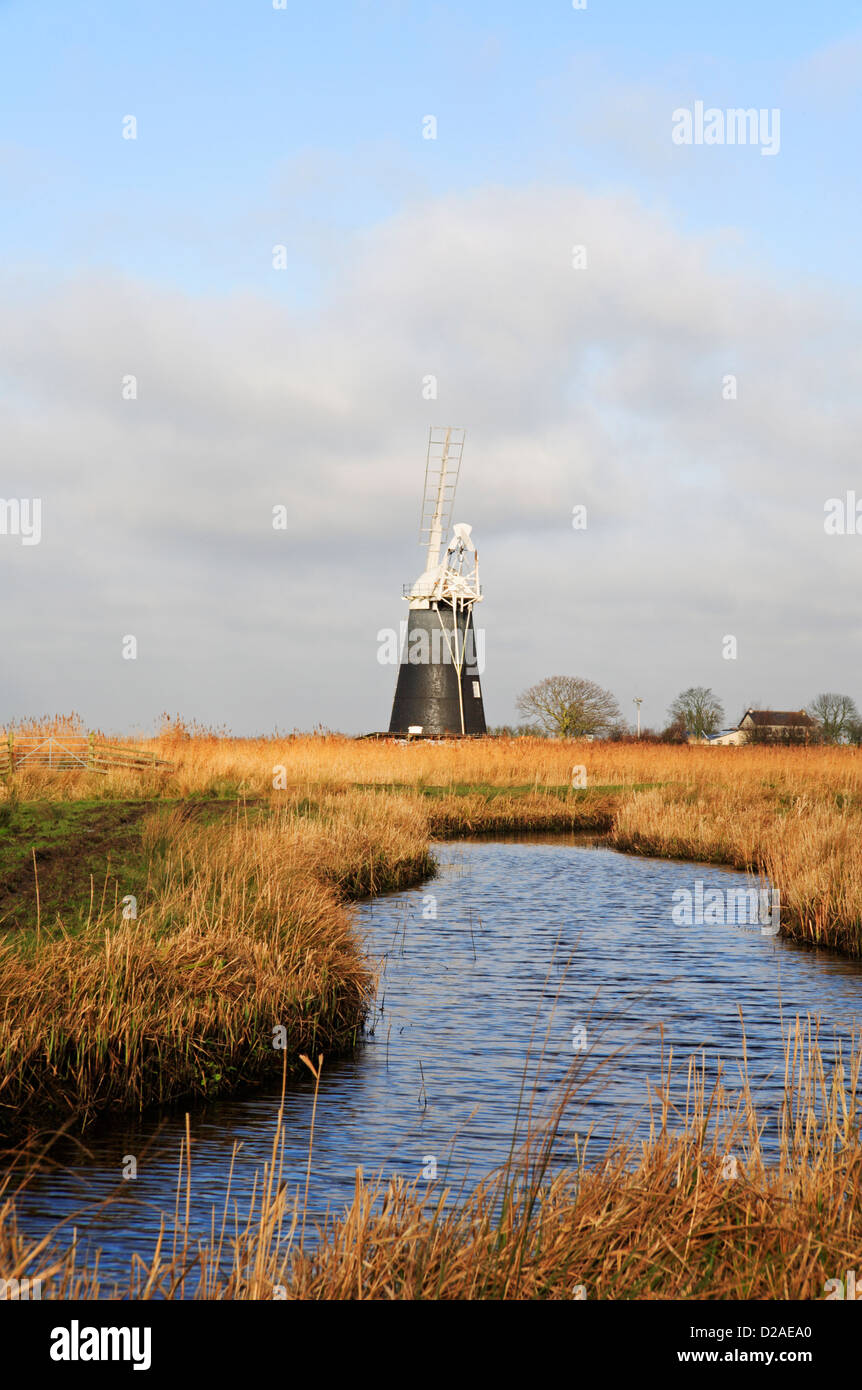 A view of Mutton's Drainage Mill by Halvergate Marshes from Wickhampton, Norfolk, England, United Kingdom. Stock Photo