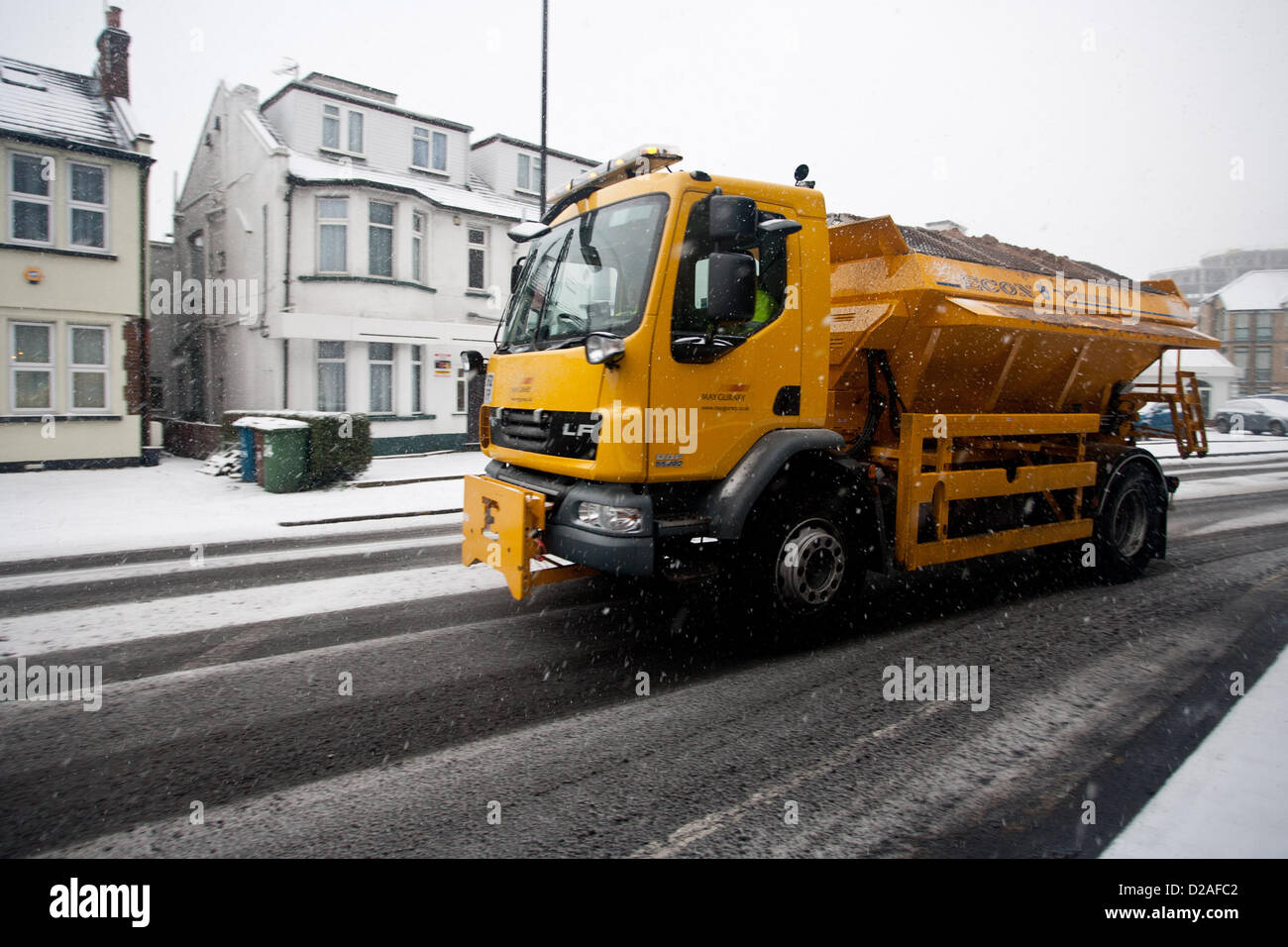 Harrow, London UK. 18th January 2013. (Pictured) A gritter truck on a icy road in London. Snow in Harrow and across the uk today Credit:  Peter Barbe / Alamy Live News Stock Photo