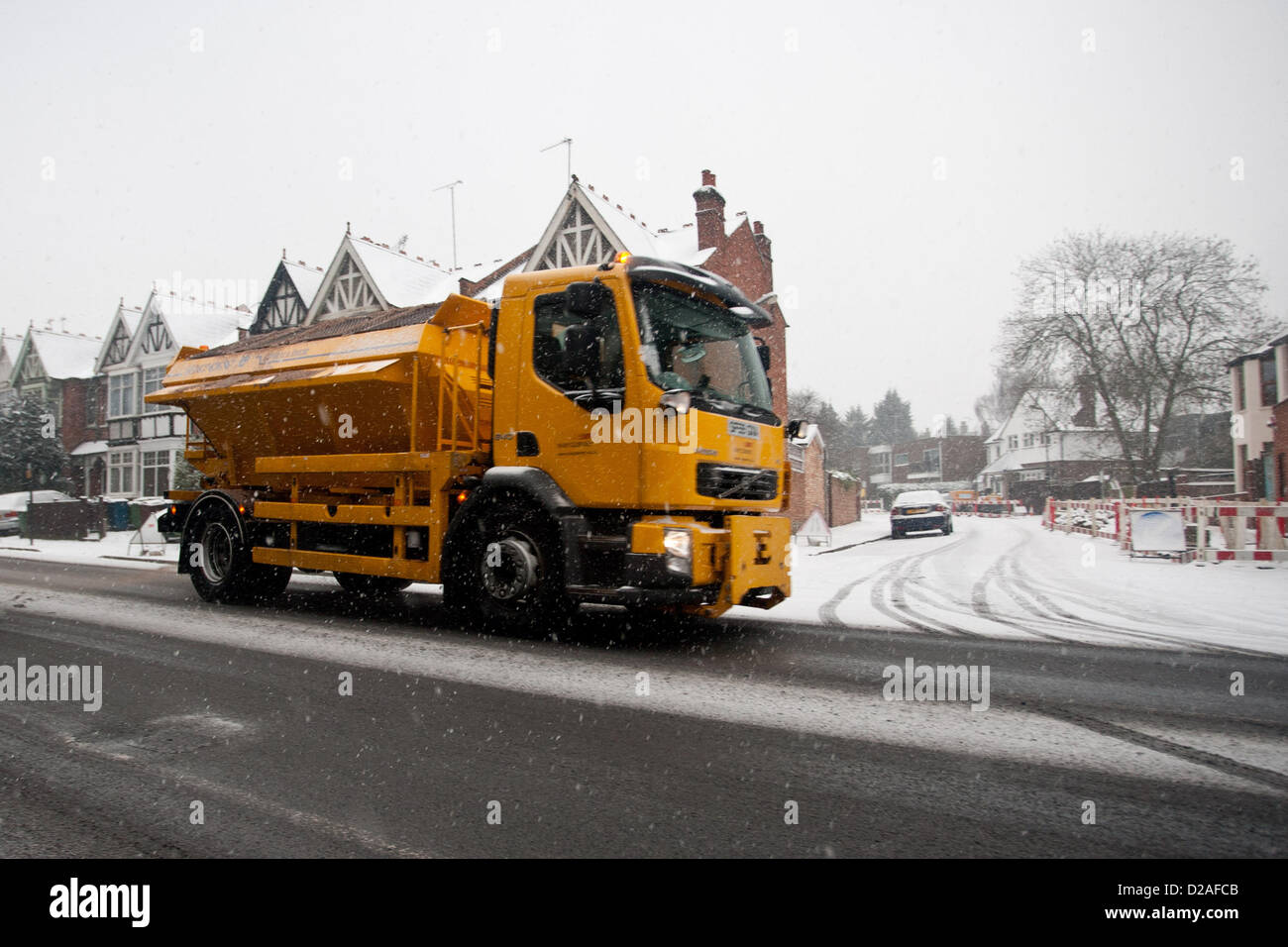 Harrow, London UK. 18th January 2013. (Pictured) A gritter truck on a icy road in London. Snow in Harrow and across the uk today Credit:  Peter Barbe / Alamy Live News Stock Photo