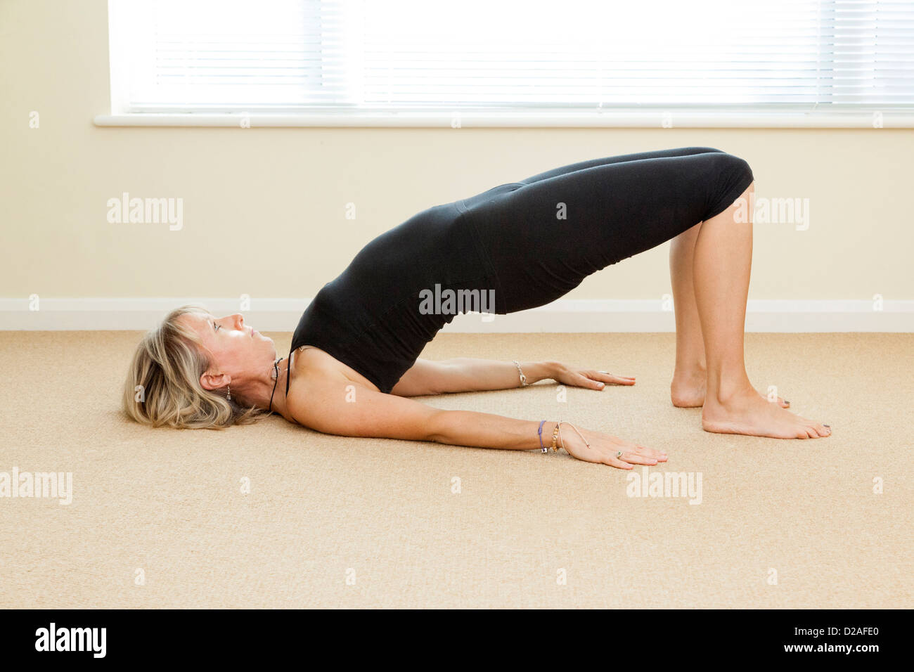 yoga pose -  bridge Stock Photo
