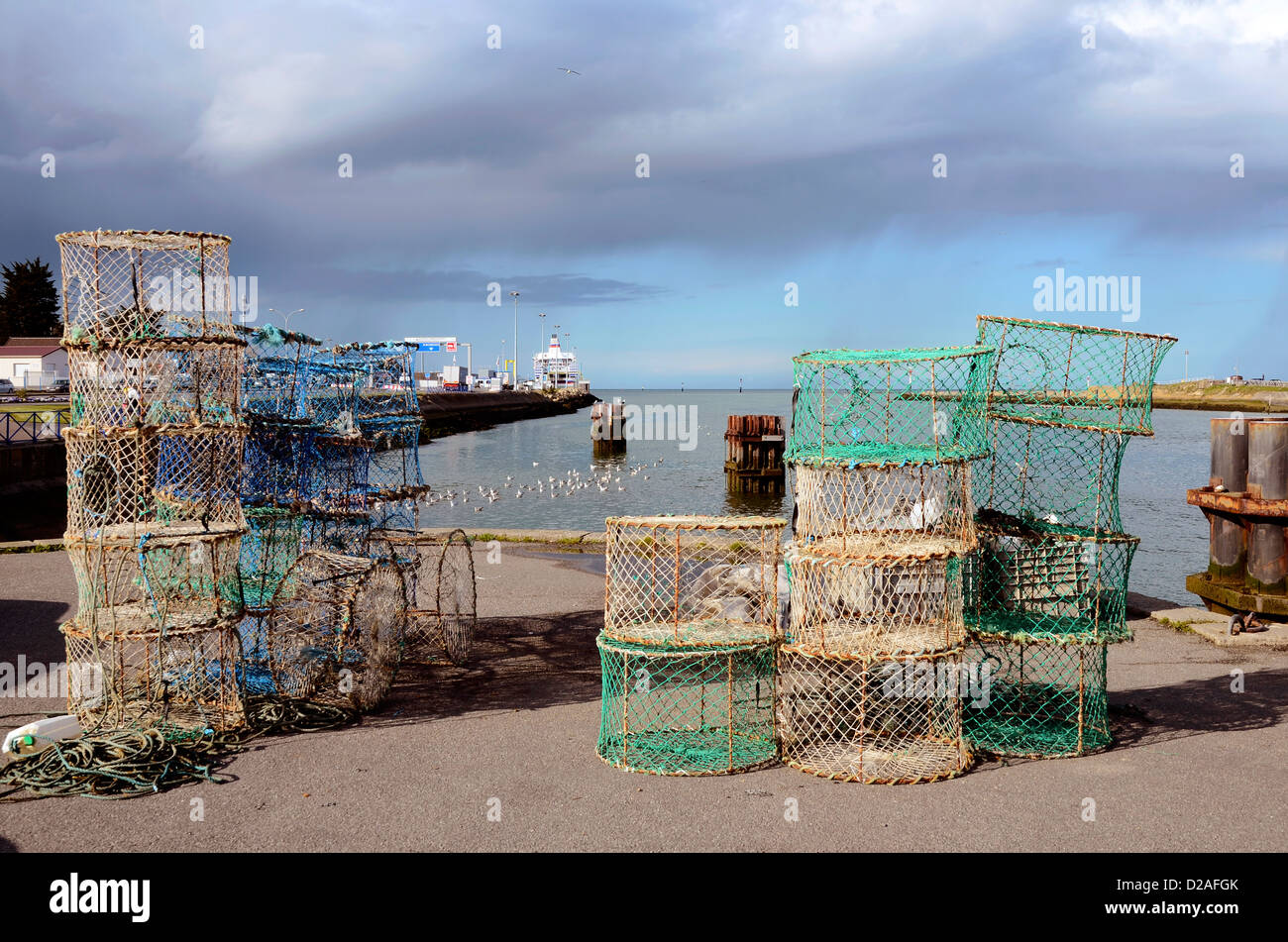 Fishing port and lobster pots at Ouistreham in the Calvados department in the Basse-Normandie region in northwestern France. Stock Photo