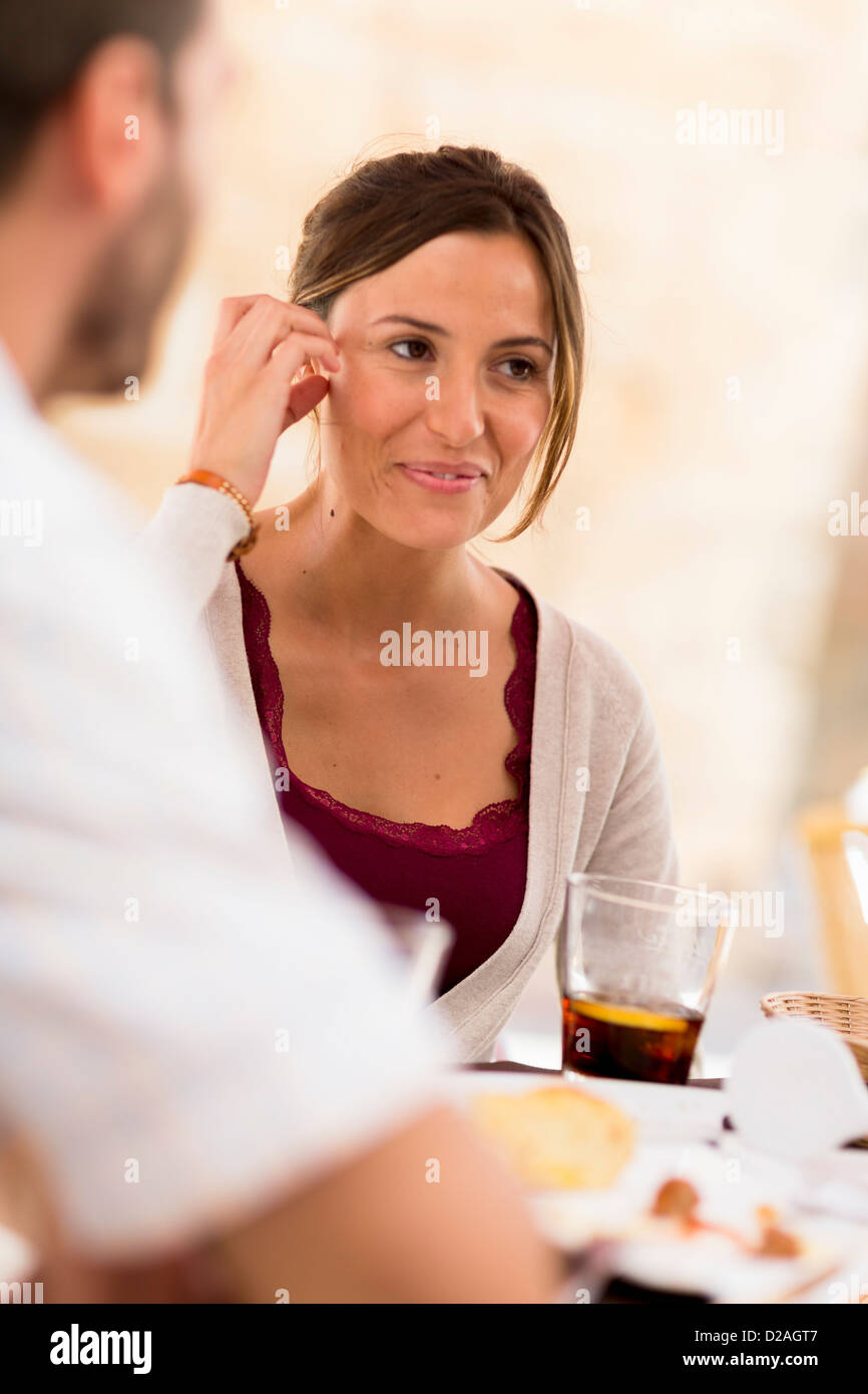Close up two men woman dining hi-res stock photography and images - Alamy