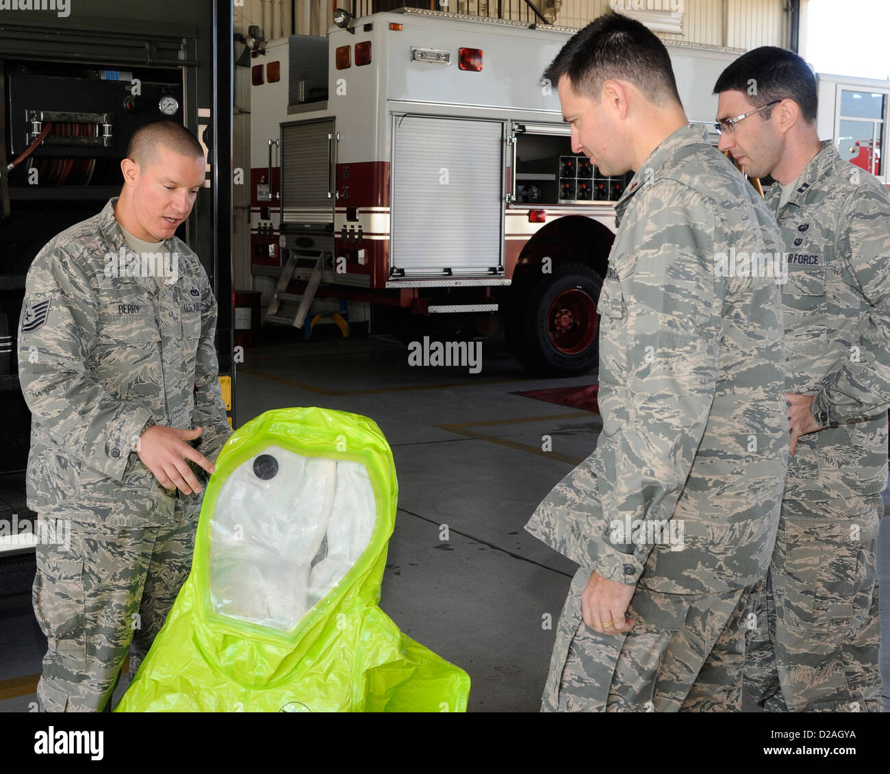 Tech. Sgt. Jarrod Berry, 8th Civil Engineer Squadron fire inspector, teaches Airmen about the hazardous material suits firefighters wear during fire safety week at Kunsan Air Base, Republic of Korea, Oct. 11, 2012. The Airmen also learned about different Stock Photo