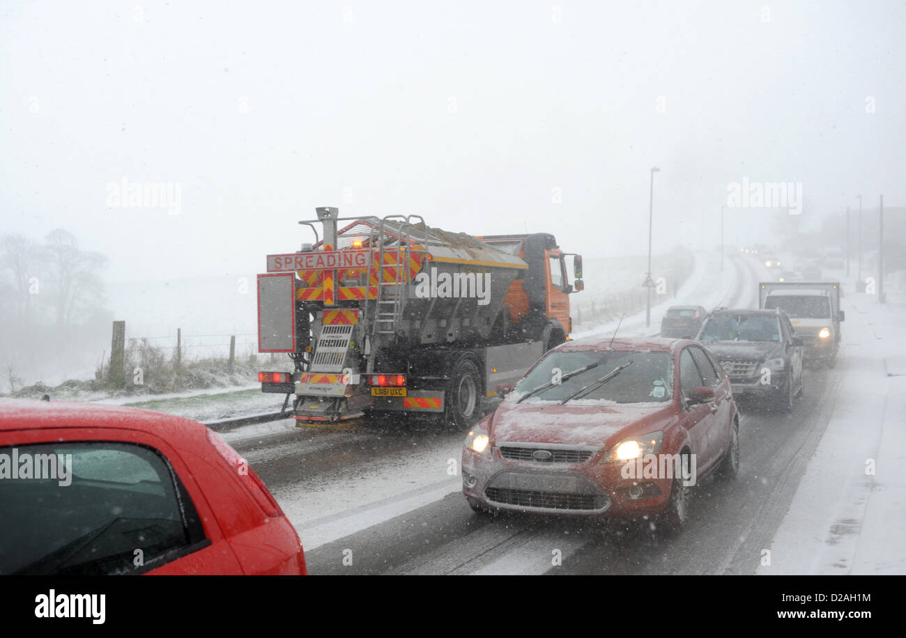 Brighton Sussex UK. 18 January 2013 - A gritting lorry gets through as there was gridlock on the roads at Woodingdean near Brighton this morning as blizzard conditions made it almost impossible to get through Photograph taken by Simon Dack/Alamy Live News Stock Photo