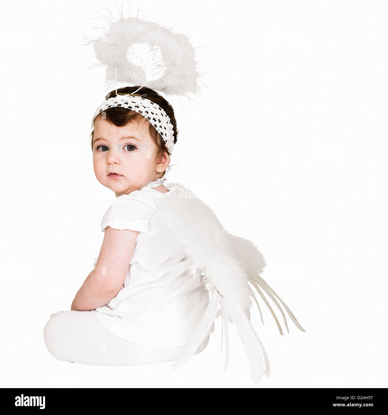 Toddler girl wearing angel costume Stock Photo Alamy