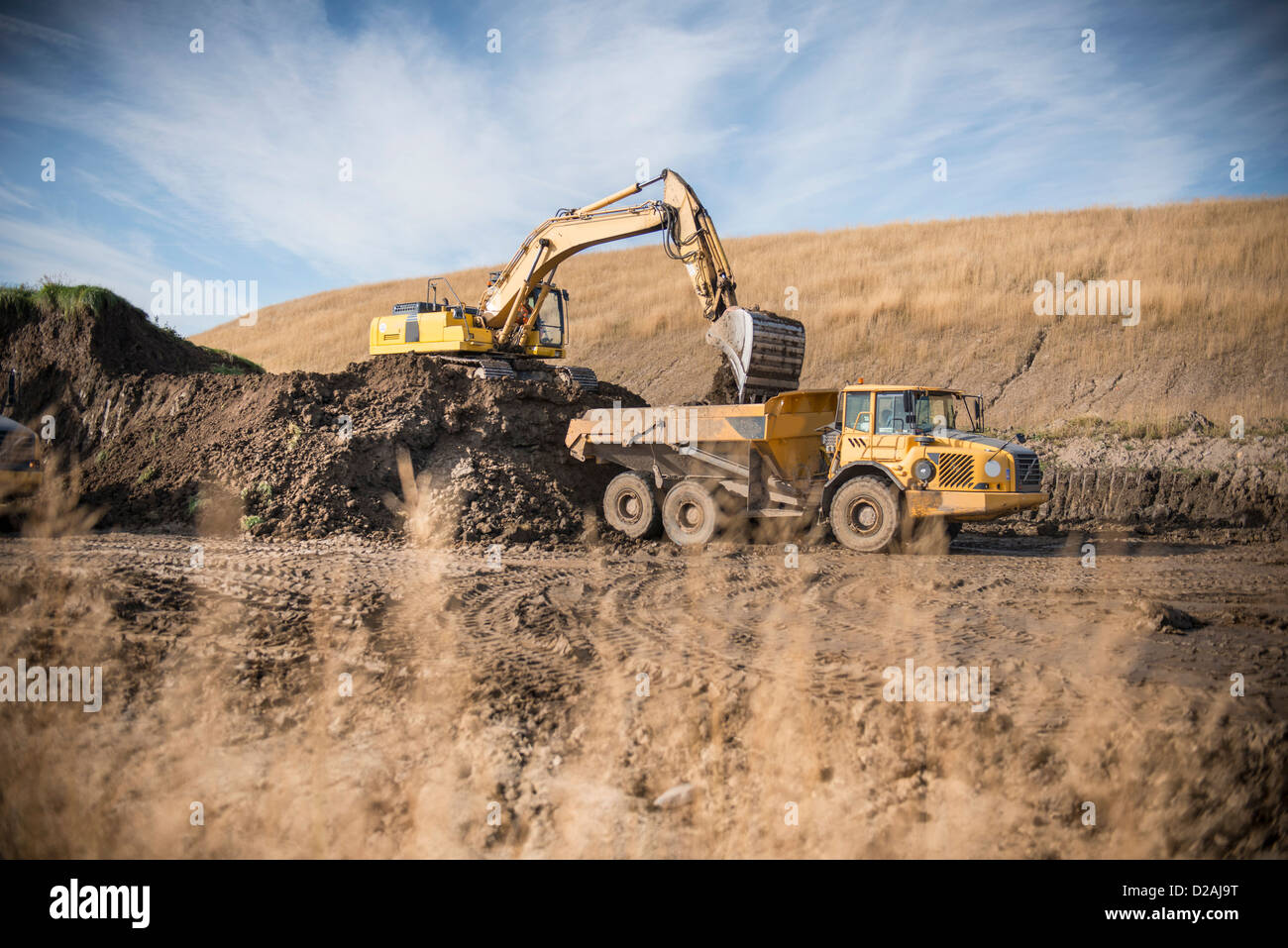 Excavator working at surface coal mine Stock Photo