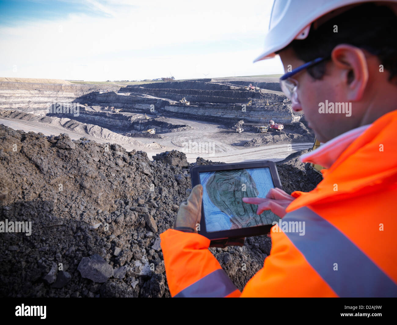 Ecologist examining surface coal mine Stock Photo