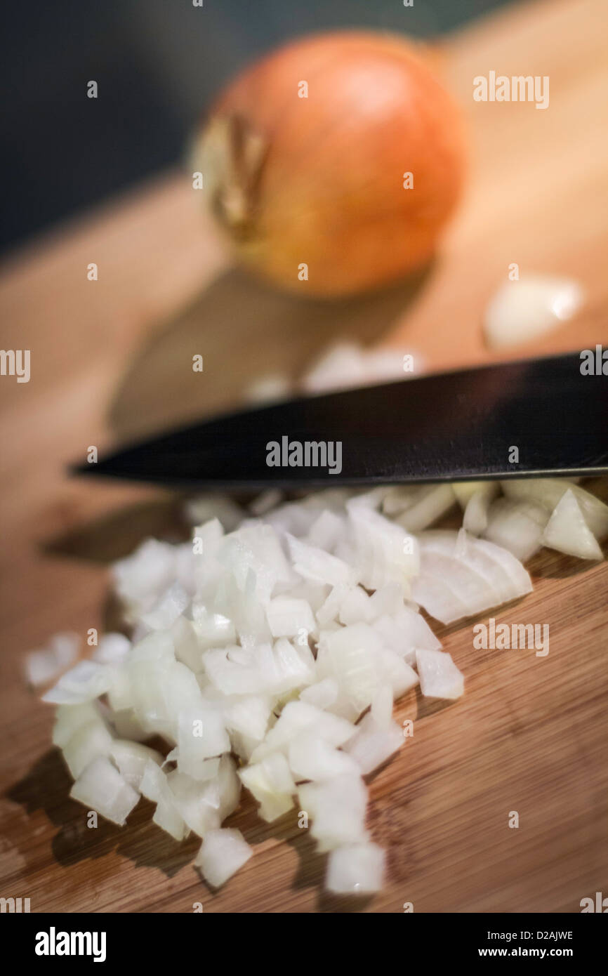 Chopped onions on cutting board Stock Photo