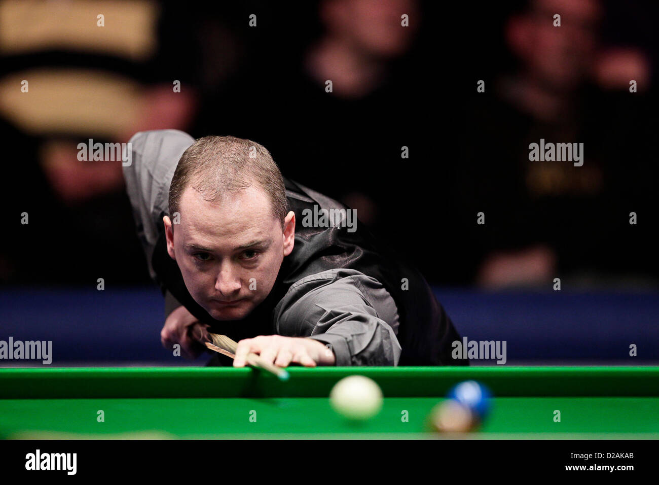 London, UK. 18th January 2013. Graeme Dott in action against Judd Trump during the Masters Snooker Quarter Finals from Alexandra Palace. Stock Photo