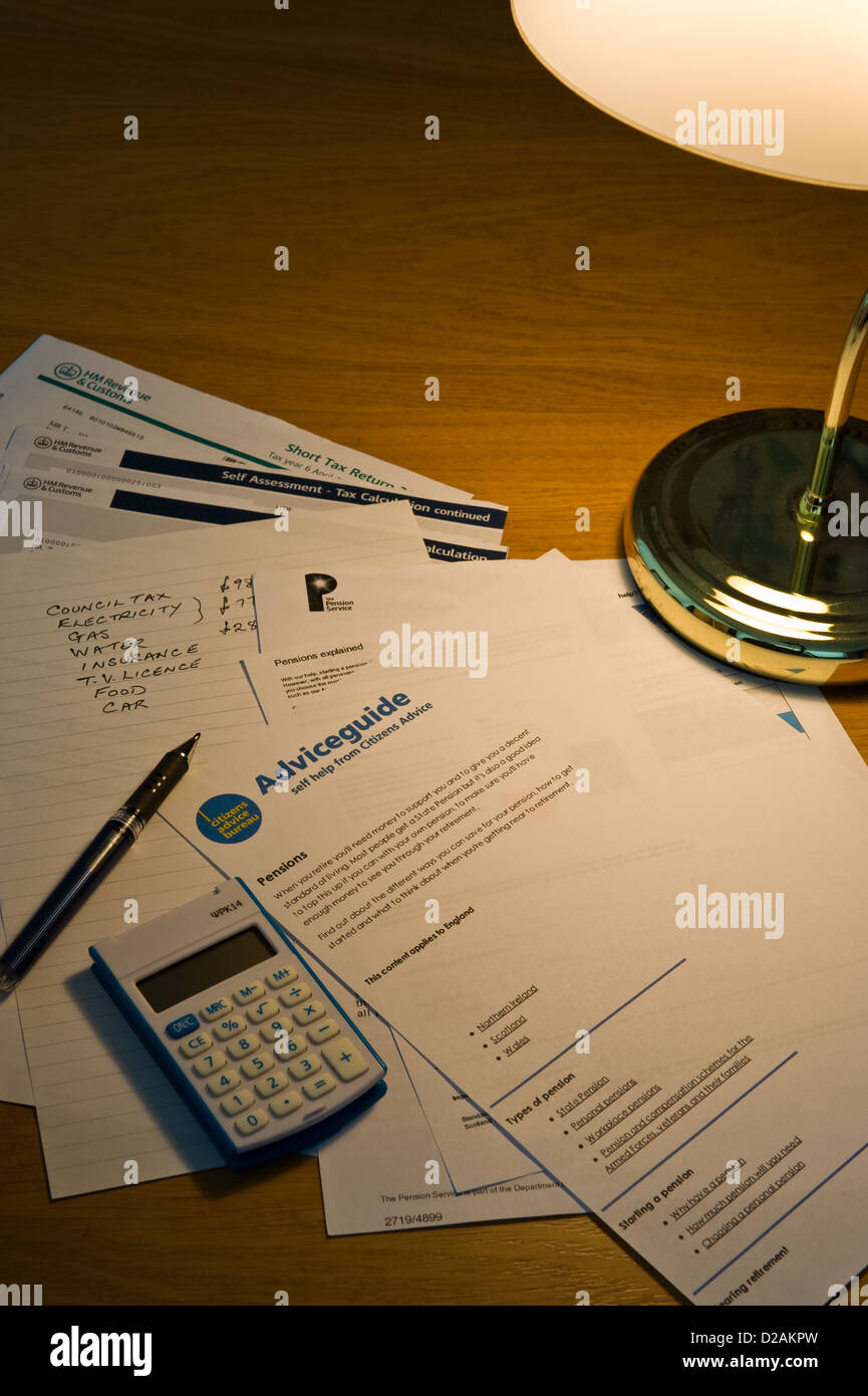 Calculating household expenses. Stock Photo