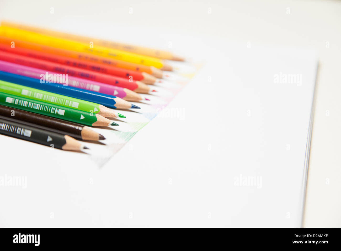 Close up of colored pencils on counter Stock Photo