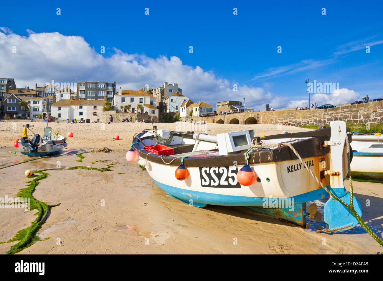 Traditional Fishing Boats at low tide on the beach in St Ives Harbour Cornwall England UK GB EU Europe Stock Photo