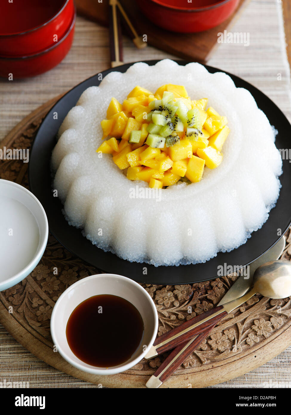 Plate of fruit and rice pudding Stock Photo - Alamy