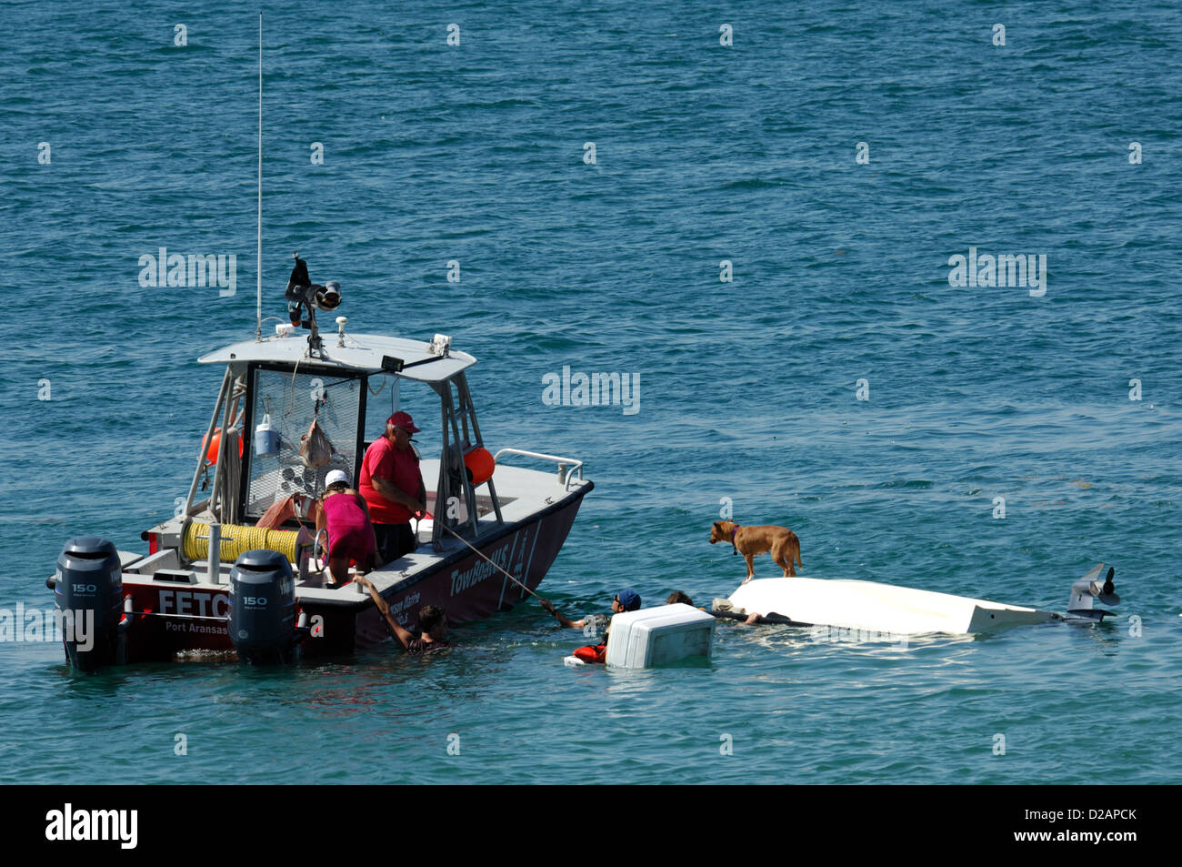 Emergency rescue of capsized boaters, Port Aransas Texas Stock Photo