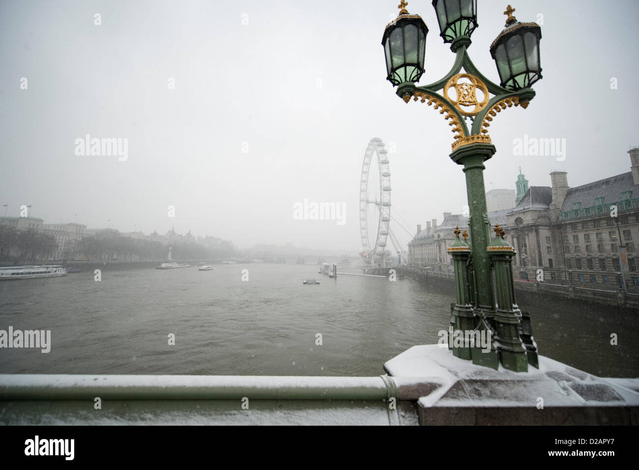 Westminster Bridge, London, UK. 18 January 2013. Snow falling in Central London creating bad visibility on Friday morning. An amber severe weather warning was announced for London and the SE of England. Credit: Malcolm Park/Alamy Live News. Stock Photo