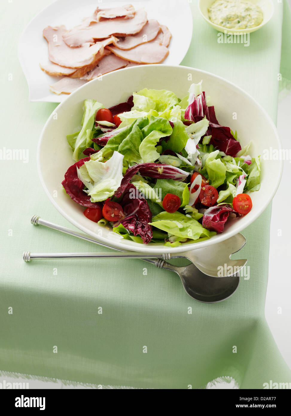 Salad bowl with slices of ham Stock Photo