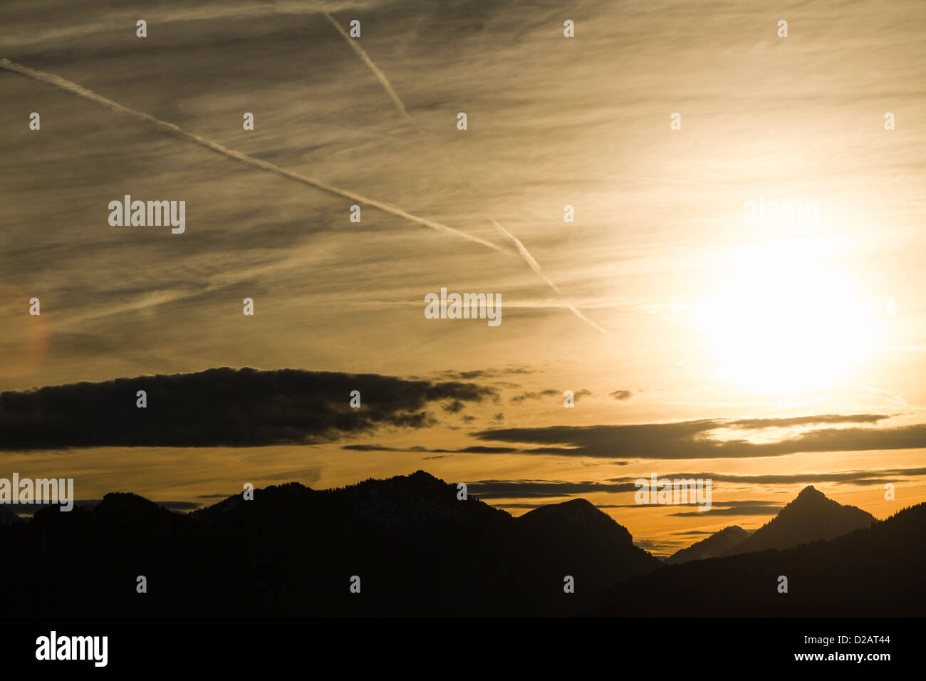 Silhouette of mountains at sunset Stock Photo