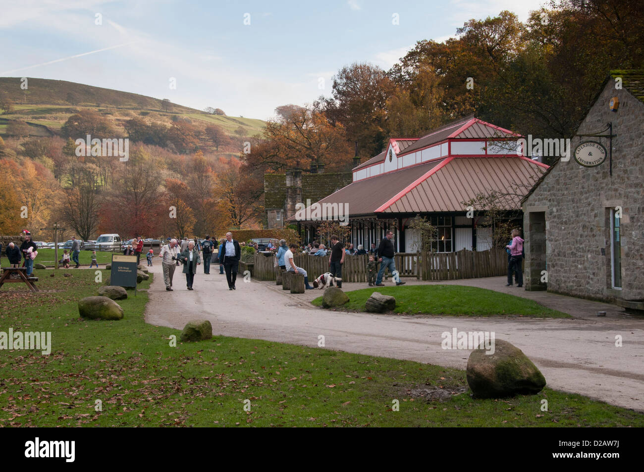 People of all ages (visitors) enjoying day out by scenic countryside cafe (Cavendish Pavilion) - Bolton Abbey Estate, Yorkshire Dales, England, UK. Stock Photo
