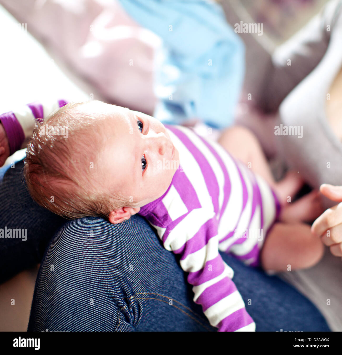 Baby standing on mothers lap hires stock photography and images Alamy