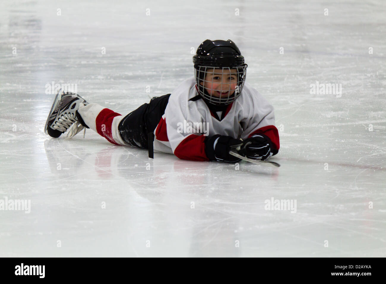 Child playing ice hockey Stock Photo Alamy