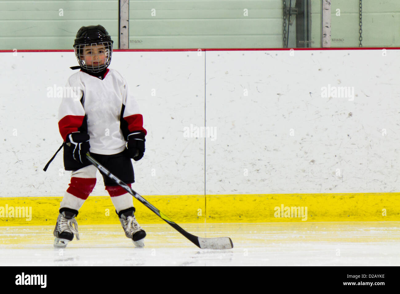 Child playing ice hockey Stock Photo Alamy