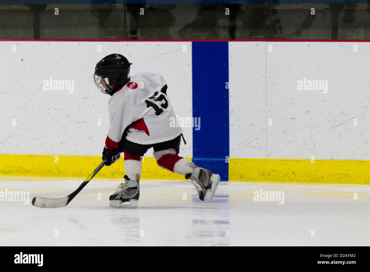 Child playing ice hockey Stock Photo Alamy