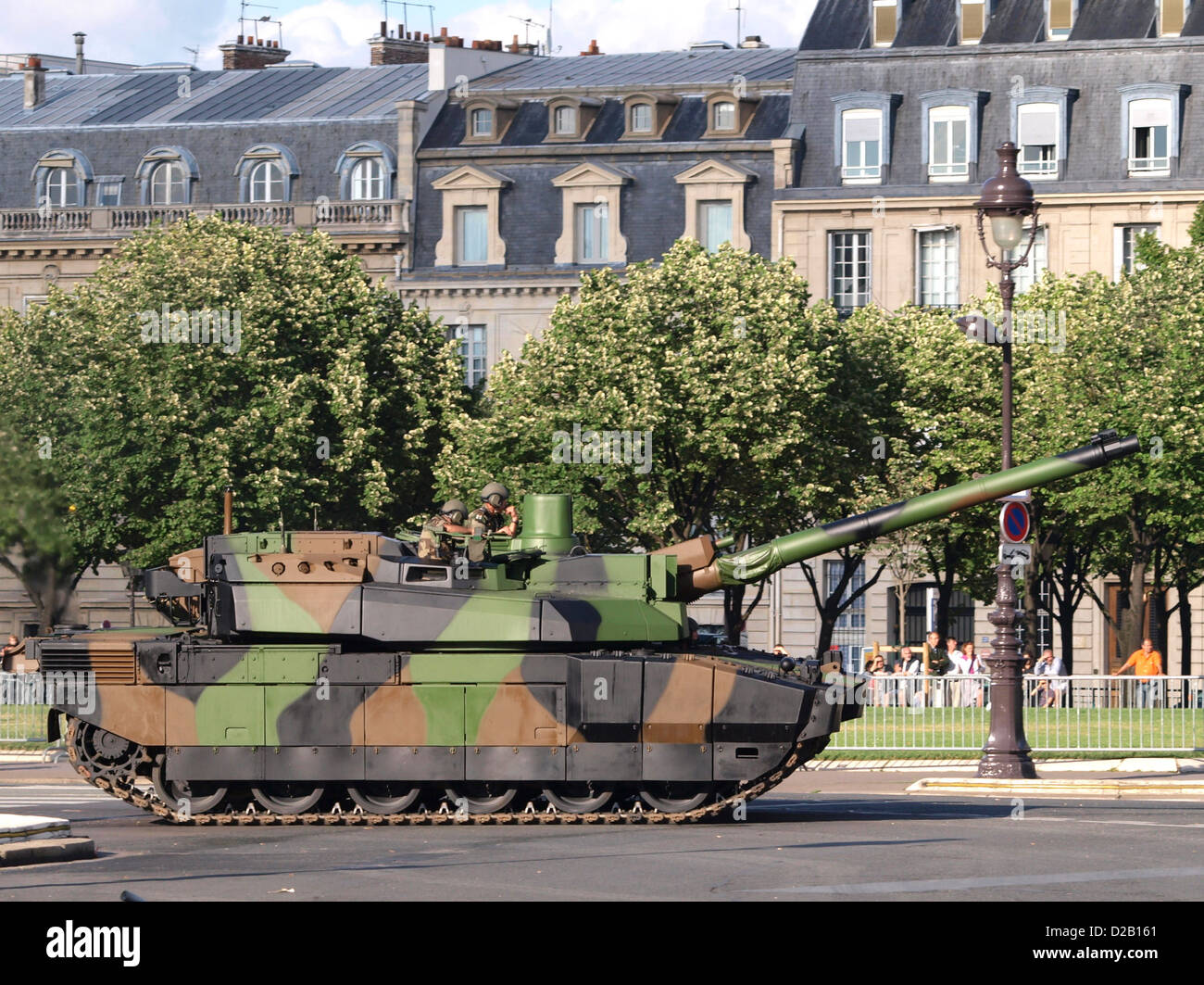 The Leclerc MBT (Main Battle Tank) is part of France's armored forces, featured in a military parade on the Champs-Élysées. It is known for its advanced armor and firepower, serving as a key component in France's modern military capabilities. Stock Photo