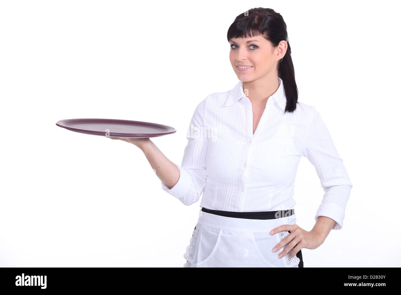Young waitress on white background Stock