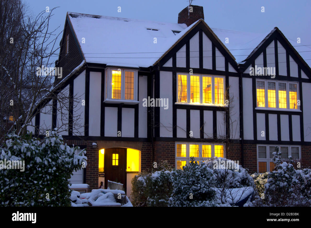 Surrey, UK. 18th Jan, 2013. UK, England, Surrey, house snow at dusk Stock Photo