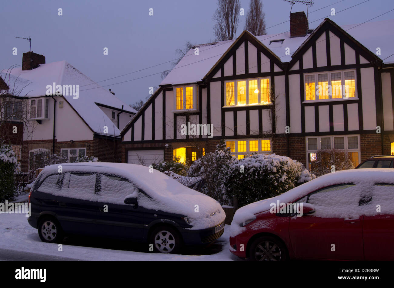 Surrey, UK. 18th Jan, 2013. UK, England, Surrey, house snow at dusk Stock Photo