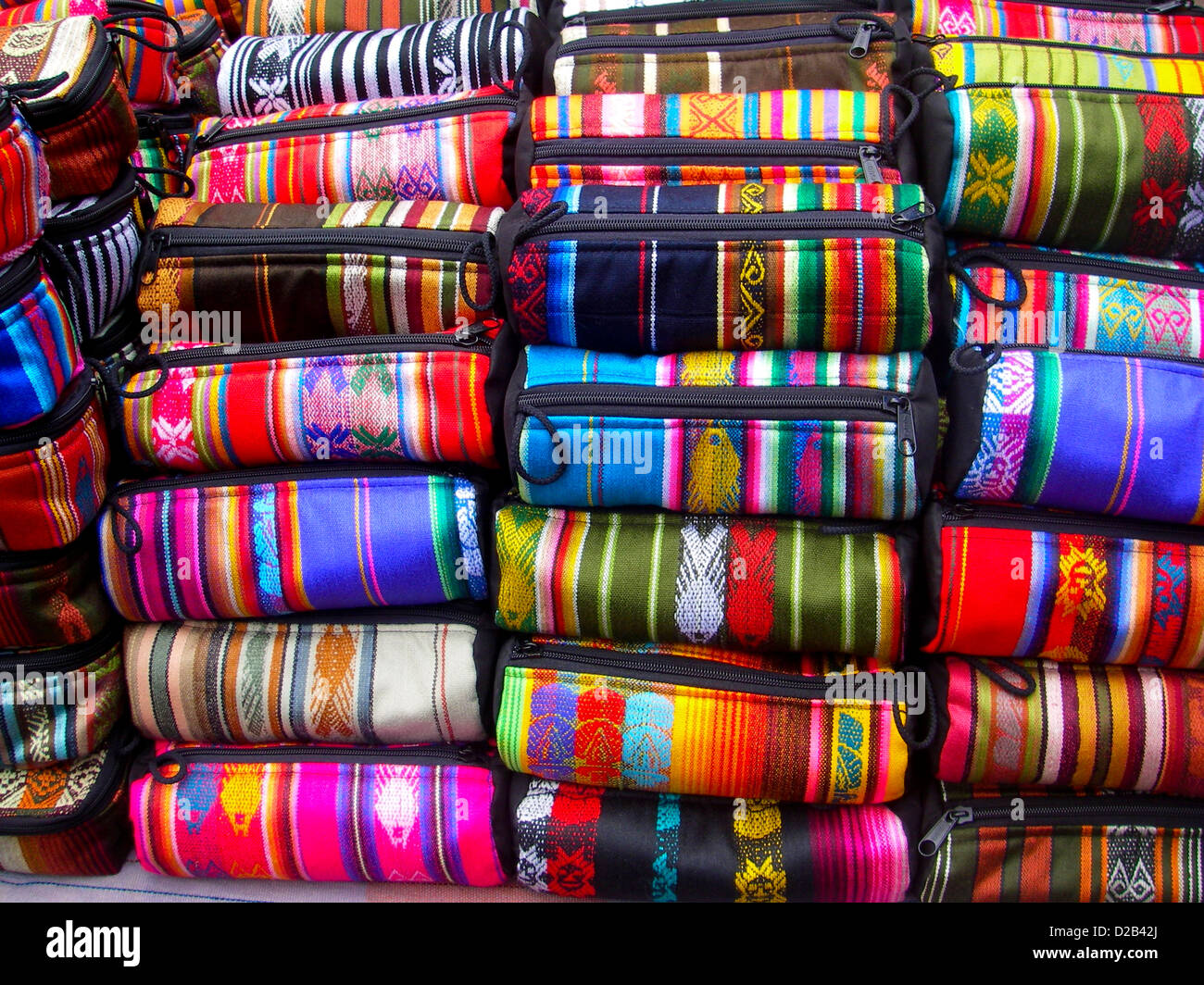 Mutil colored Ecuadorian woven bags made from alpaca wool found in an Ecuador market, South America Stock Photo