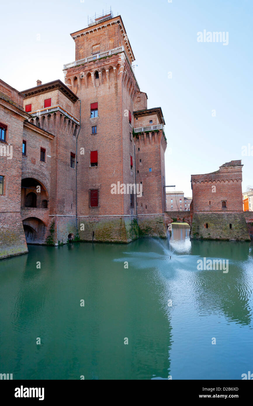 side view moat and Castello Estense in Ferrara, Italy Stock Photo