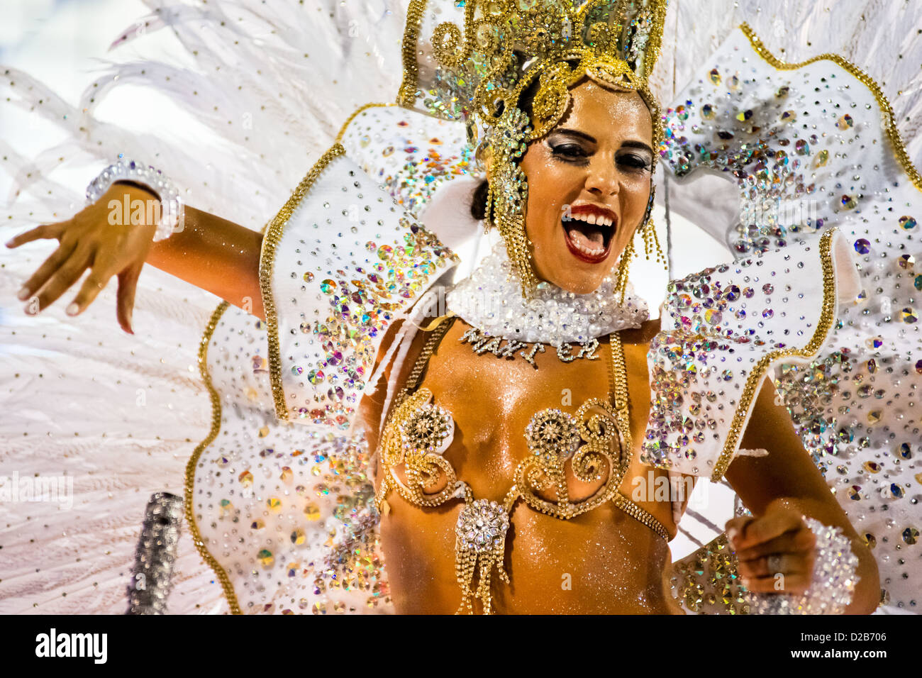 A dancer of Imperatriz samba school performs during the Carnival parade at the Sambadrome in Rio de Janeiro, Brazil. Stock Photo