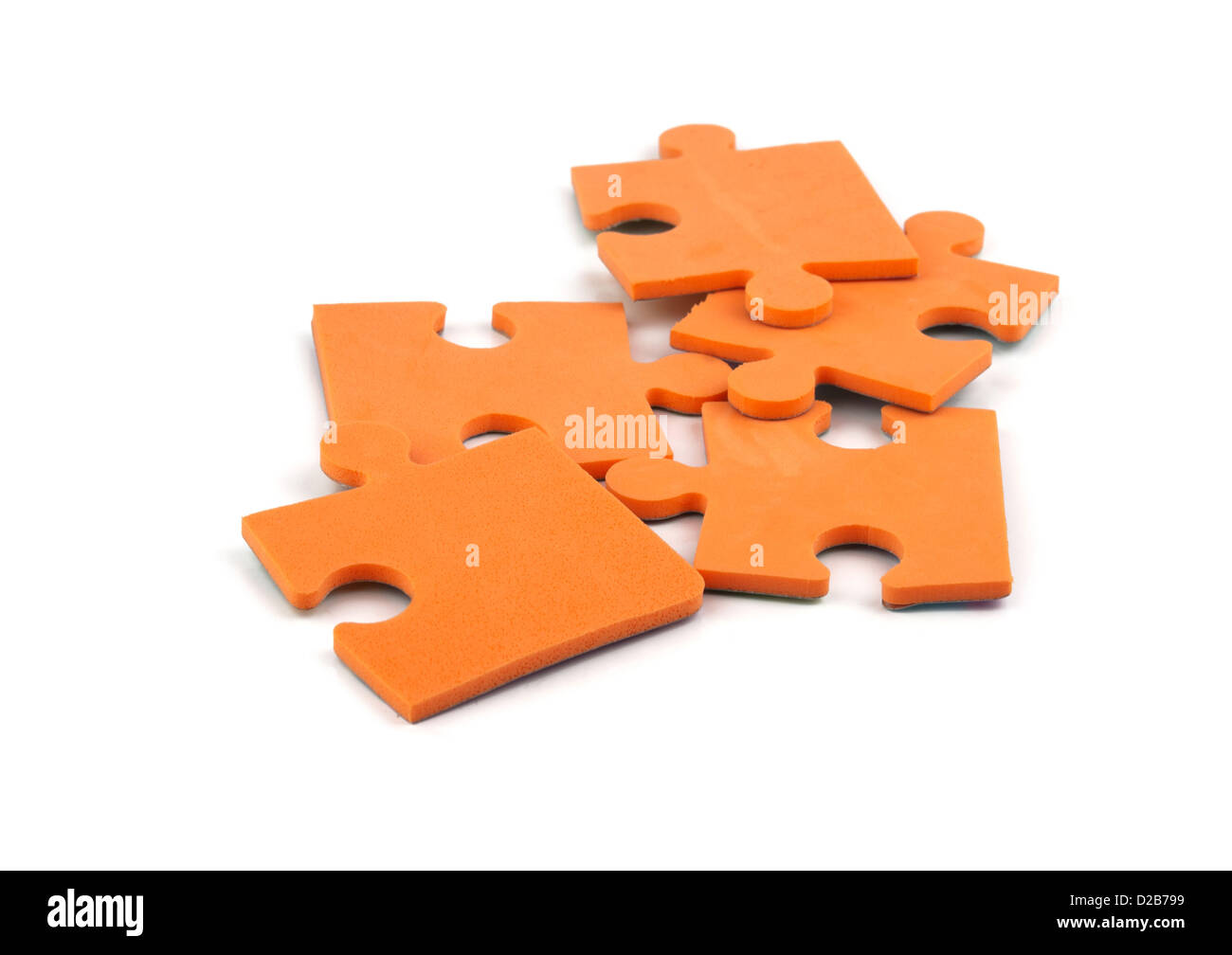 orange jigsaw puzzle pieces Stock Photo Alamy