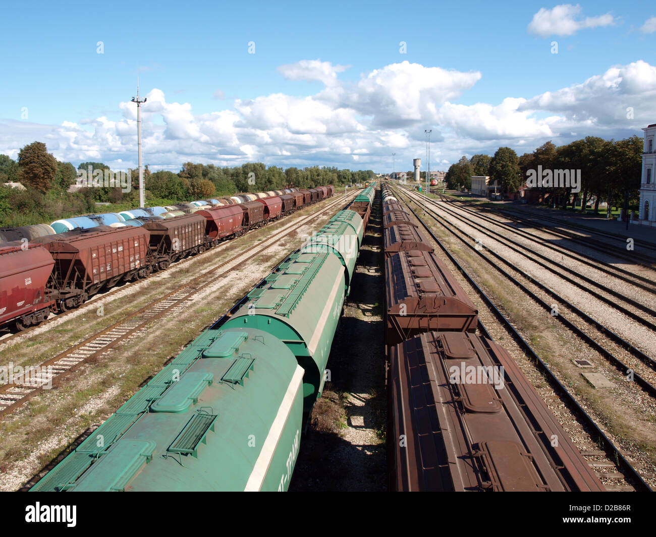 Freight train wagons on the station rails Stock Photo