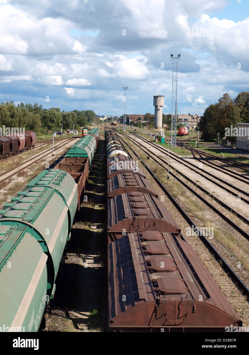 Freight train wagons on the station rails Stock Photo